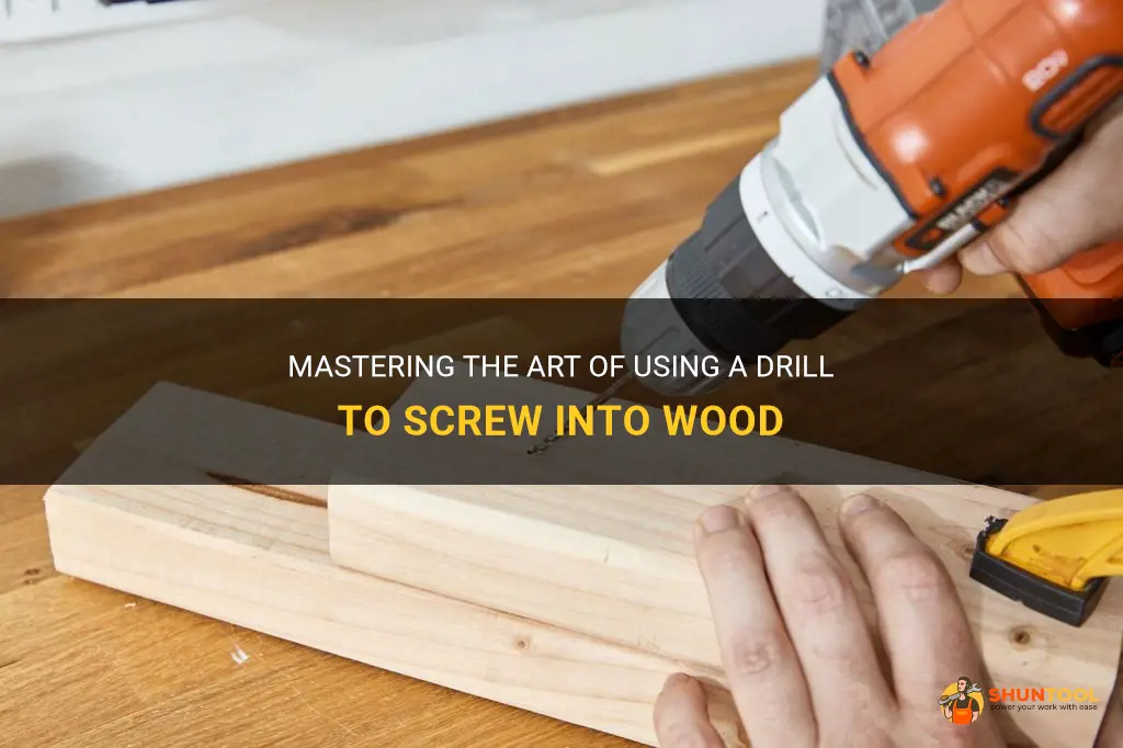 how to use a drill to screw into wood
